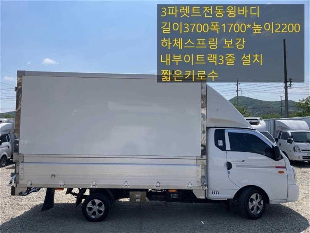 현대 포터2 1톤 롱바디 윙바디 2023년식 주행 23,258km 중고 화물차 대표 이미지
