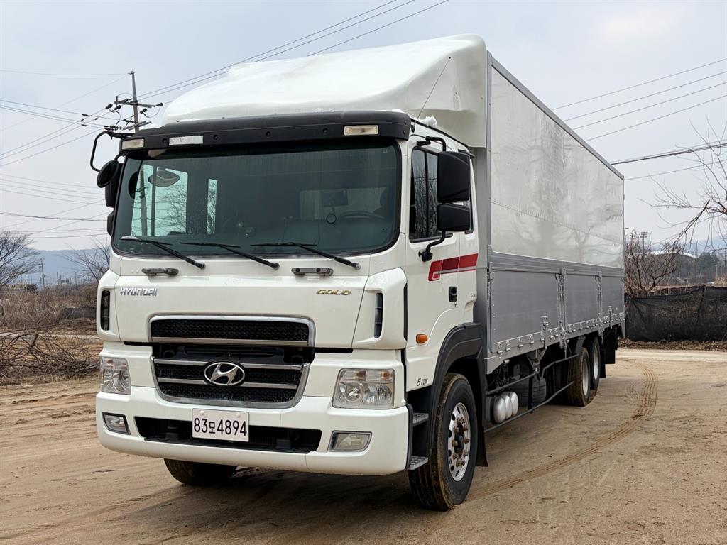 현대 메가트럭 6.5톤 후축 윙바디 2015년식 중고 화물차 2015-06 주행 308,595km 대표 이미지