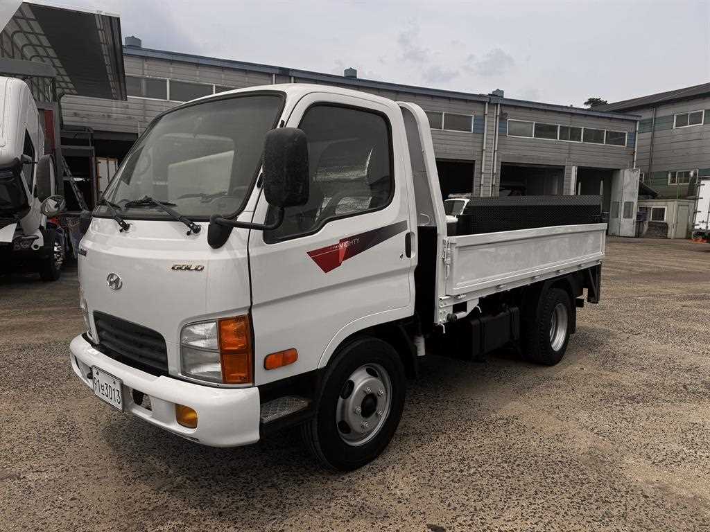 현대 마이티 2톤 고상 카고 파워게이트 2013년식 주행 335,145km 중고 화물차 대표 이미지