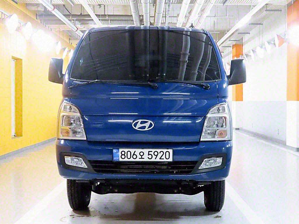 LPG 2.5 터보와 4WD 복륜 구조가 확인되는 2024년식 포터2 1톤 덤프