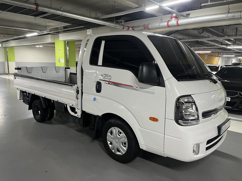 기아 더뉴봉고3 1톤 킹캡 초장축 수직형 2단 파워게이트 2023년식 주행 37,077km 중고 화물차 카고 대표 이미지