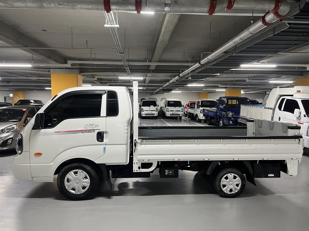 기아 더뉴봉고3 1톤 킹캡 초장축 수직형 2단 파워게이트 2023년식 주행 37,077km 중고 화물차 카고 상세 이미지 4