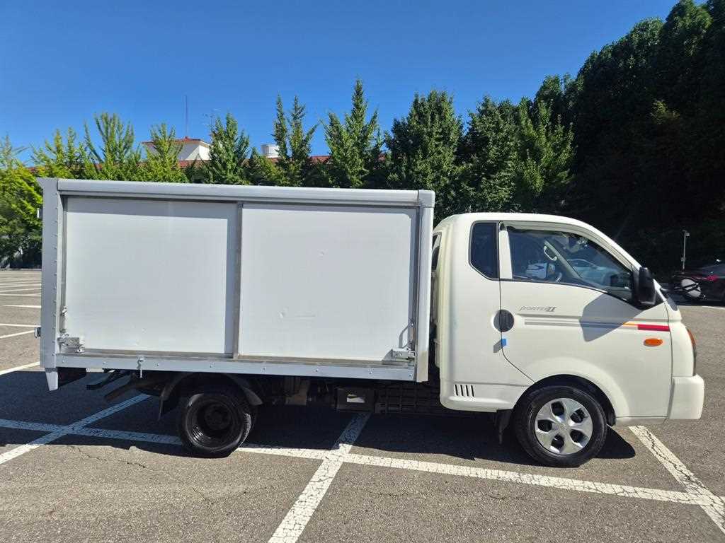 현대 포터2 1톤 저상내장탑 양문미닫이 2019년식 주행 91,878km 중고 화물차 대표 이미지