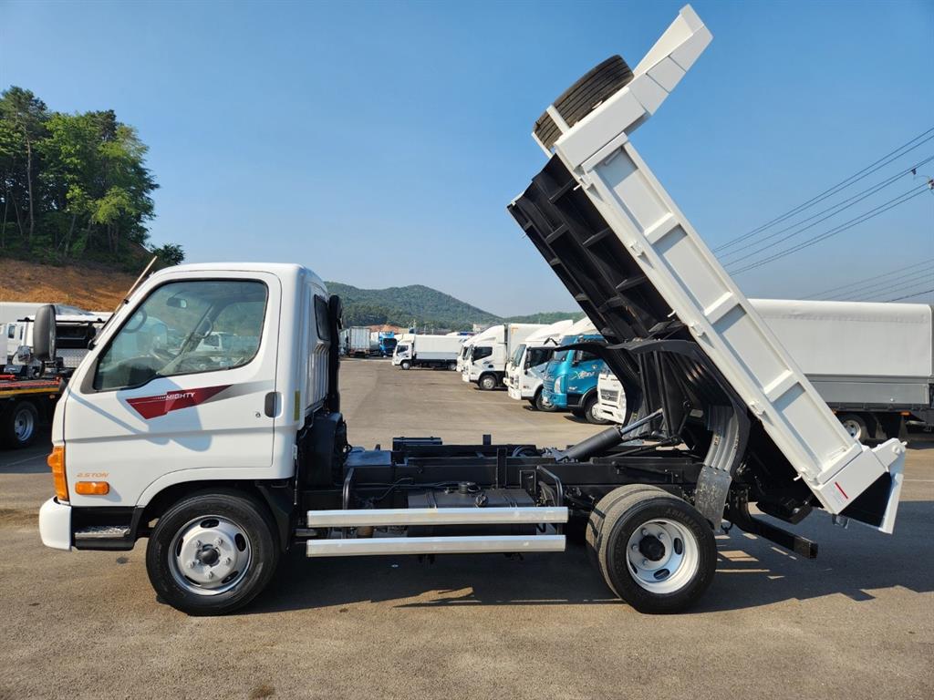2013년식 주행 37,635km 마이티 큐티 2.5톤 정품 덤프 중고 화물차 상세 이미지 14