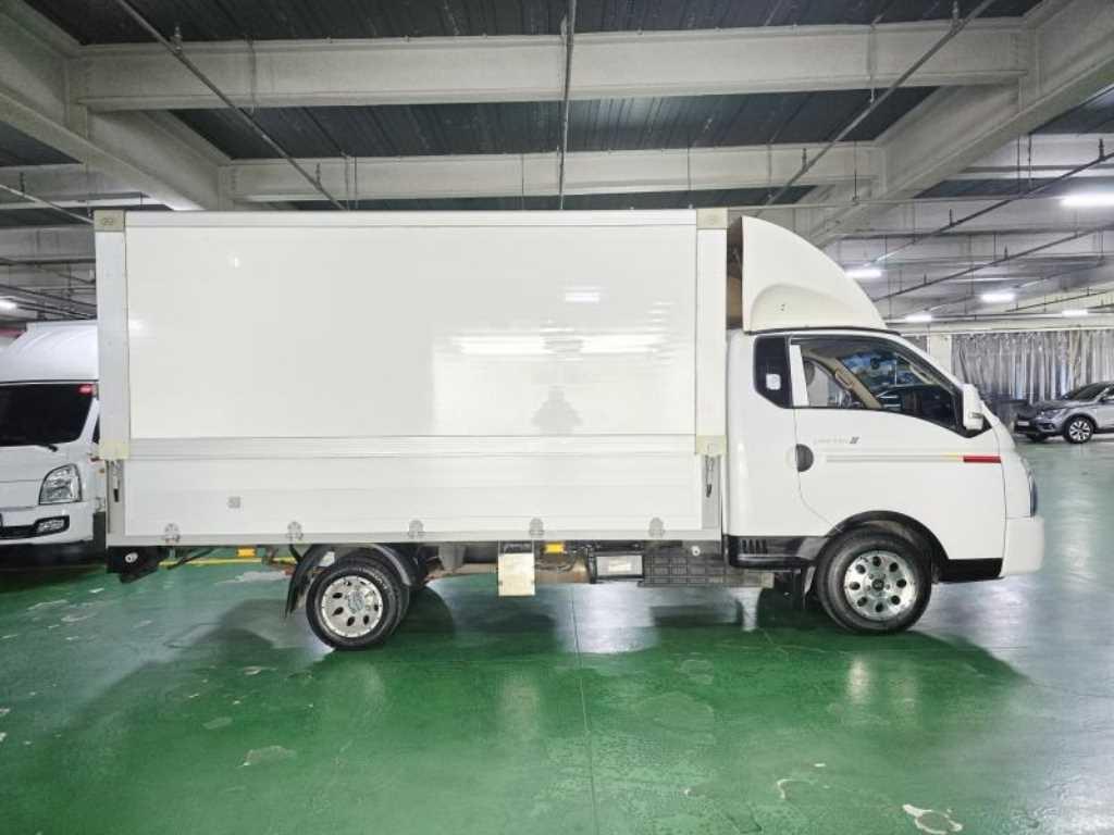 현대 포터2 1.3톤 롱바디 전동식 윙바디 2023년식 주행 215,899km 중고 화물차 상세 이미지 3