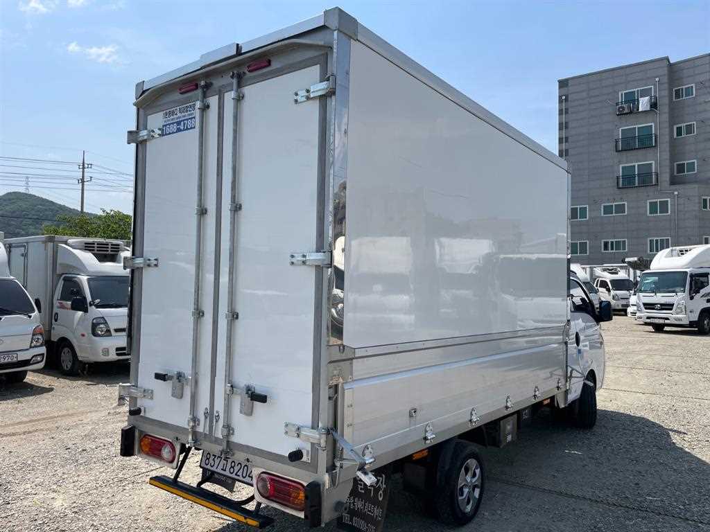 현대 포터2 1톤 롱바디 윙바디 2023년식 주행 23,258km 중고 화물차 상세 이미지 4