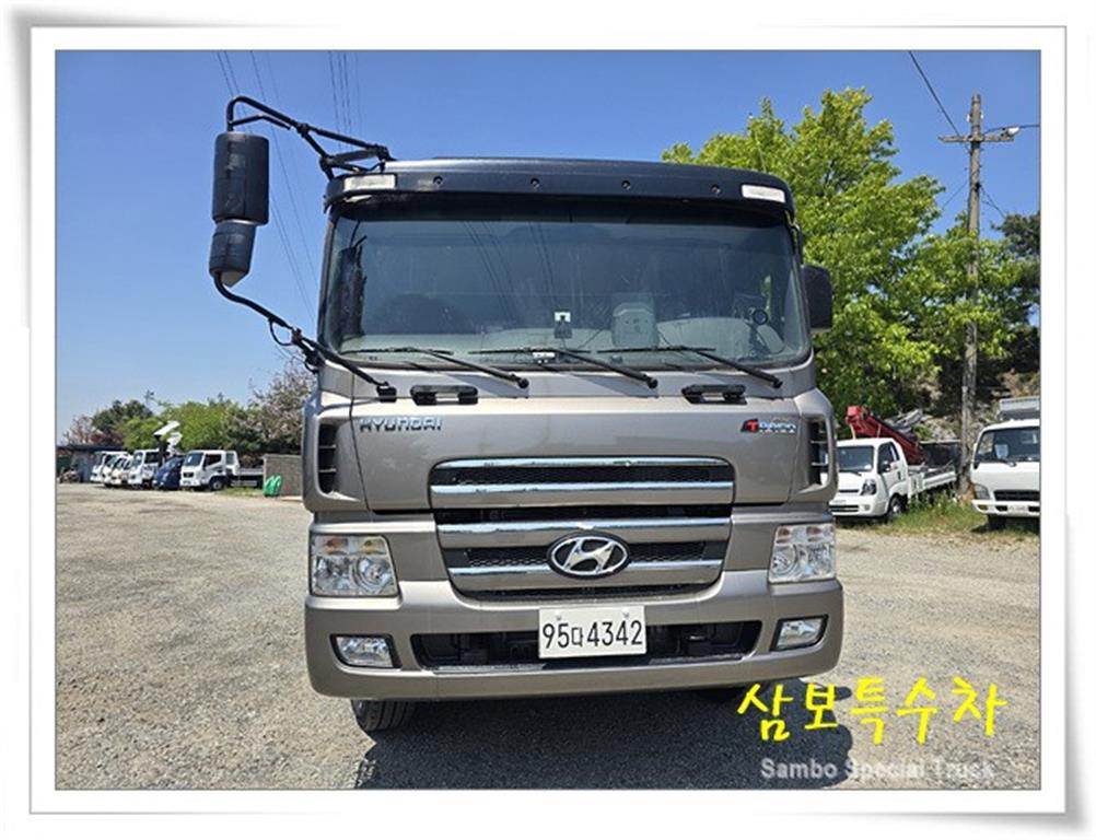 현대 트라고 25톤 롱바디 암롤트럭 2013년식 주행 1,052,374km 중고 화물차 상세 이미지 3