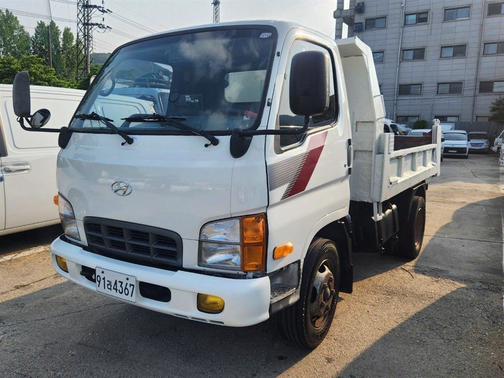 현대 e-마이티 2.5톤 큐티 덤프 2005년식 중고 화물차 2005-11 주행 477,500km 대표 이미지